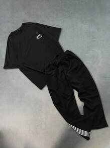 PAVTROS Manfinity Streetrush Men's Knitted Fabric Co-Ords Set: Stylish Black Half Sleeve Round Neck T-Shirt And Long Pants With Side Stripe Detail - Black - View 2