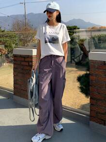DAZY Camiseta oversize con gráfico de paisaje y eslogan, cuello caído