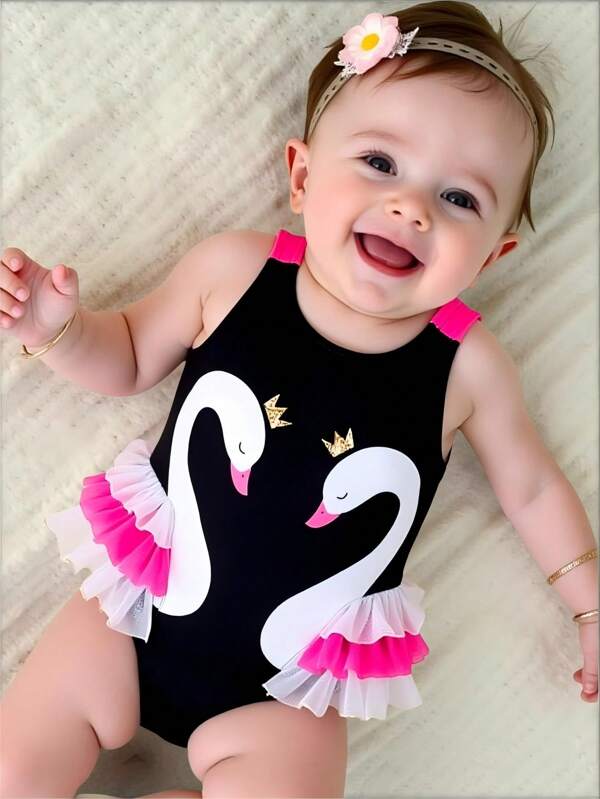 SHEIN Traje de baño de una pieza con cuello redondo, patchwork de malla y estampado de animales para bebé niña