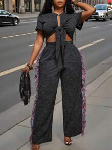 Slaydiva Conjunto de 2 piezas para mujer 2025 Nuevo, Vacaciones, Pascua, Graduación, Rave, Festival, Concierto, Fiesta de Cumpleaños, Casual Sexy: Top corto de manga corta con nudo delantero y pantalones largos holgados tipo maxi con bloques de color y flecos, Talla Grande Negro