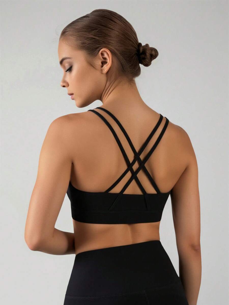 SHEIN حمالة صدر رياضية لفتيات المراهقات تمتص العرق، ذات حشوة قابلة للإزالة وأربطة متقاطعة، مناسبة للرياضة والتمارين اليوغا - الأسود - مشاهدة 1