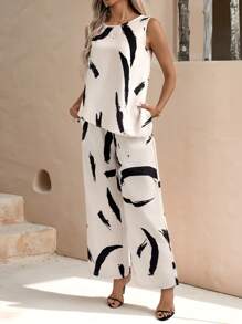 SHEIN Clasi 2pcs Women Summer Printed Asymmetrical Hem Tank Top And Loose Pocket Long Pants Set Summer Outfits For Women/Summer/Summer Clothes Elegant Vacation Casual Boho Women's Clothing Graduation Dress/White Graduation Dress/Prom Dress Brunch Outfits For Women Wedding Guest Dress Women Church Outfits Women/Church Clothes Women - Black and White - View 3