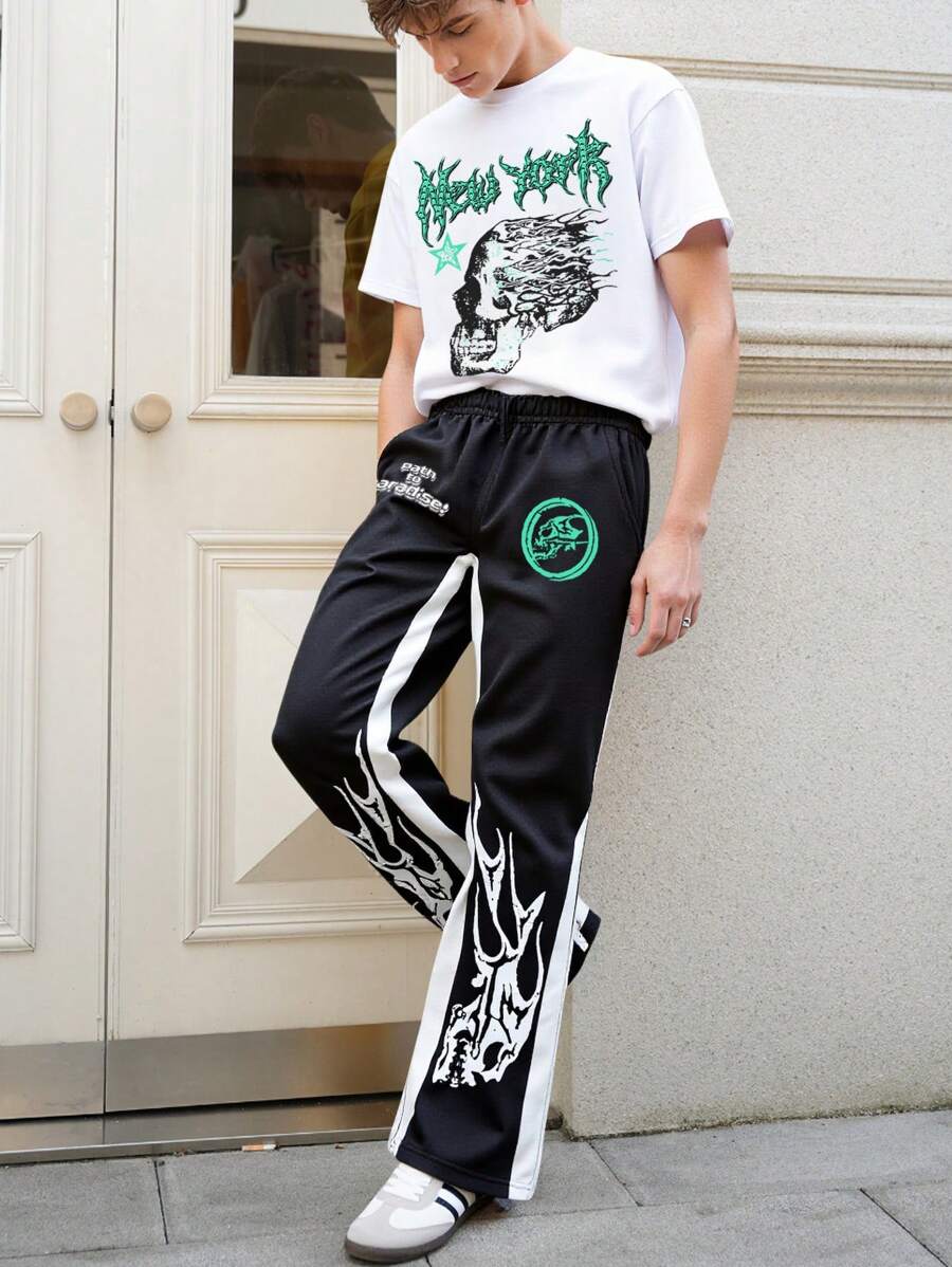 Manfinity Roghcode 火焰印花青春休闲男士T恤套装,是送给男朋友或老公的绝佳礼物。男士青春街头INS风T恤套装,白色T恤上的骷髅印花与绿色字体相得益彰,黑色长裤上点缀着夸张的火焰图案。整体造型酷炫前卫,街头时尚气息十足。 - 黑與白 - 查看 1