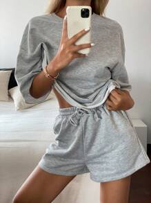 Livesso Dames zomer casual effen kleur drop shoulder T-shirt & shorts set van 2