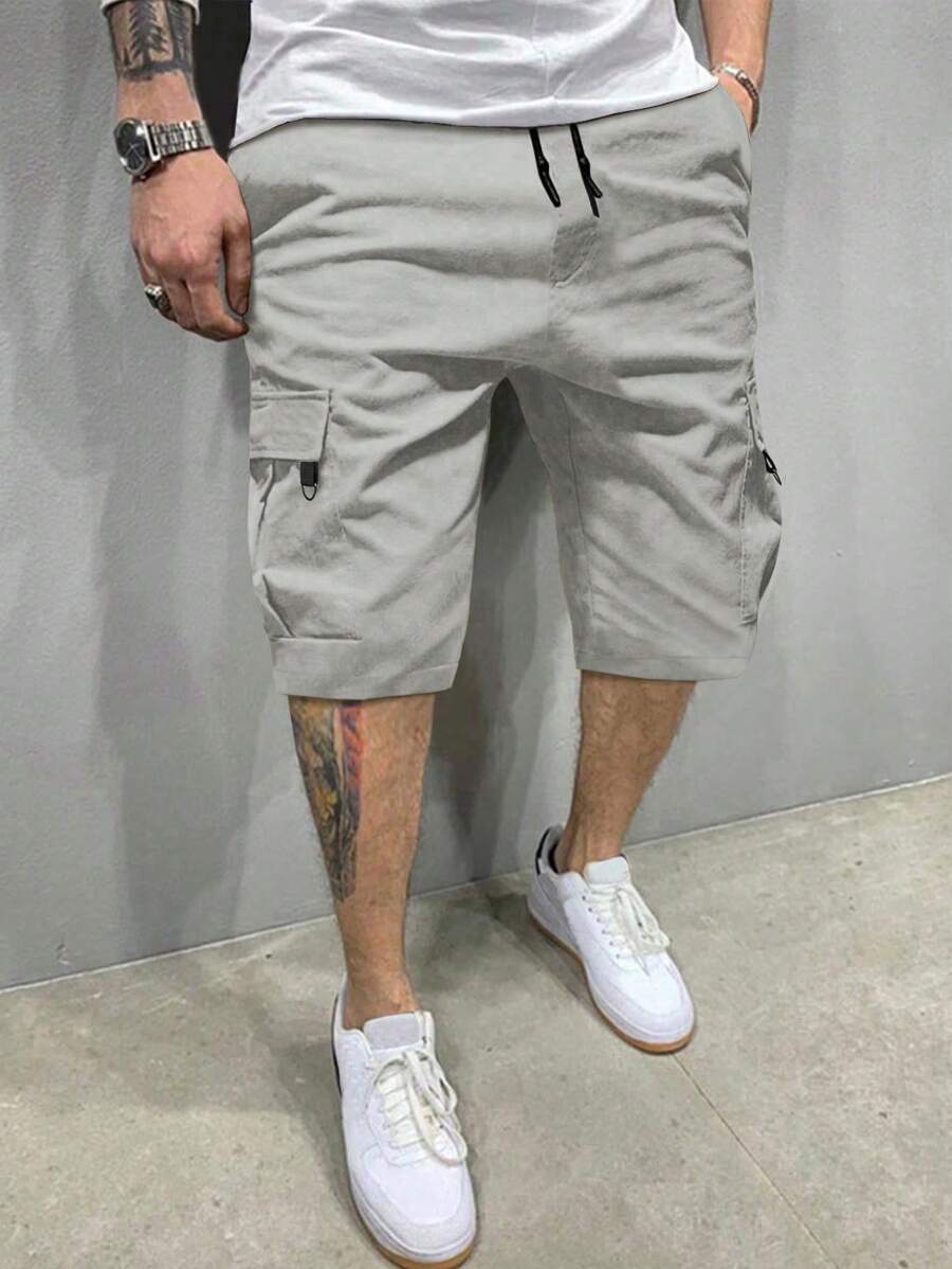 Manfinity Homme 宽松男式翻盖口袋抽绳腰工装短裤