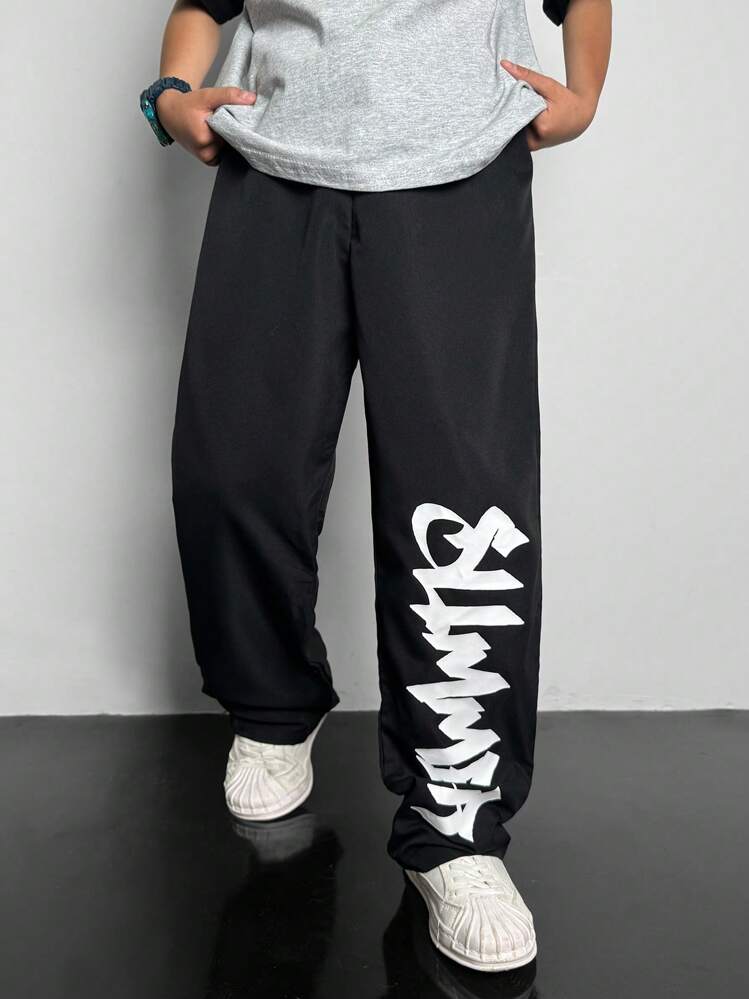 SHEIN 1 Piece Tween Boy Casual Sports College Straight Black Trousers With Ribbon Graffiti Letters Suitable For Back To School Suitable For Birthday Parties, Evening Parties, Performances, Weddings, Baptisms, Opening Ceremonies Daily Suitable For Daily Use Suitable For School Suitable For Travel Suitable For Sports Suitable For Spring And Summer Seasons - Black - View 4