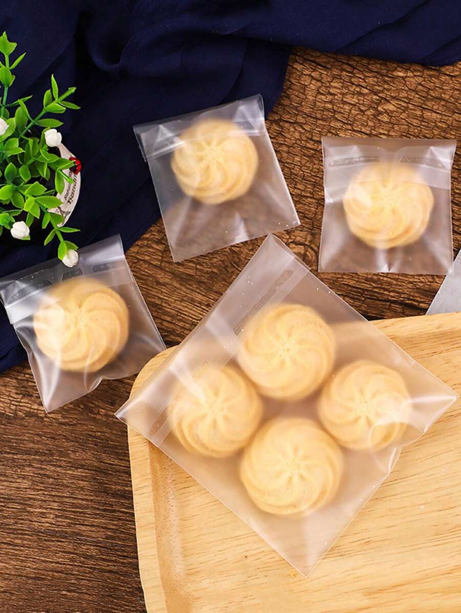 SHEIN 100pcs Clear Cookie Packaging Bag School Supplies Food Bag Food Box Suitable For Candy Chocolate Cookies Etc. - Clear - View 1