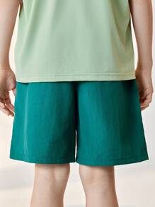 JNSQ Vêtements de rentrée scolaire, shorts décontractés amples pour préadolescentes et garçons, shorts décontractés amples avec poches et taille élastique pour enfants - Vert sapin - Voir 3