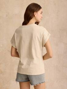 Poéselle Camiseta de 100% algodón con bordado de patrón de ojo simbólico, conjunto de verano, esencial para la temporada de bodas, camiseta bordada estilo "Cottagecore", de manga corta, estilo casual chic y sin esfuerzo