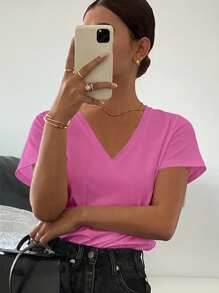 Livesso Camiseta casual holgada de manga corta con cuello en V de unicolor para mujeres, casual de oficina