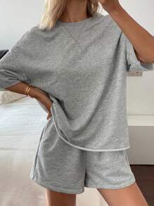 Livesso Dames zomer casual effen kleur drop shoulder T-shirt & shorts set van 2