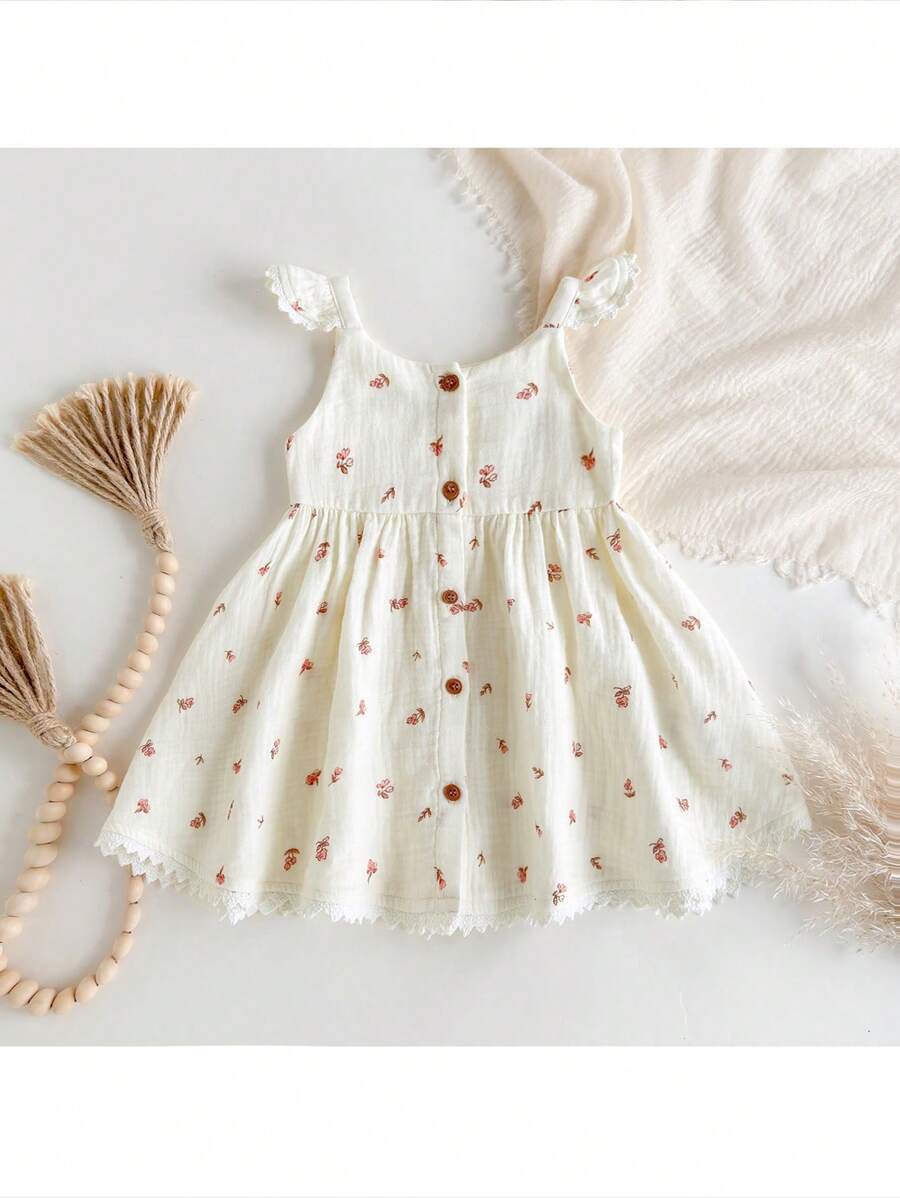 Loomiva Baby Girl Ditsy Floral Pattern Round Neck Cap Sleeve Cinched Waist Dress - Apricot - View 1