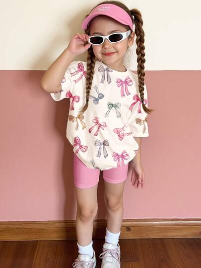 SHEIN 2pcs/Set Young Girl Casual Bowknot Decor Short Sleeve Loose T-Shirt And Shorts Set, Suitable For Summer