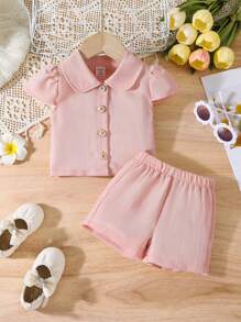 SHEIN Bộ áo blazer và quần short tay lửng màu be nhạt, kiểu dáng thời trang và thanh lịch cho bé gái mùa hè. Chất liệu vải nhẹ, mềm mại, thoải mái khi mặc, lý tưởng cho những ngày hè nóng bức. Tay áo lửng kiểu phồng tạo điểm nhấn tinh nghịch, mang đến vẻ ngoài vừa thanh lịch vừa đáng yêu, dù tham dự tiệc hè hay đi mua sắm, chắc chắn đây sẽ là điểm nhấn nổi bật trên đường phố mùa hè này. - Hồng - Xem 4