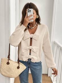 SHEIN Frenchy Suéter de mujer con cuello en V de unicolor, decoración de lazo, hombro caído, manga larga, cálido y cepillado, para uso casual, de oficina, minimalista, "old money", sencillo. Puede usarse sobre una camiseta. Cárdigan lindo, muy cálido y suave, ropa de invierno, parte superior de suéter de mujer, atuendos de otoño para mujer, suéteres de mujer - Albaricoque - Ver 3