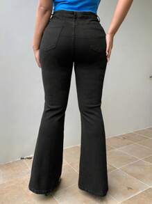 Dazy Plus Jeans neri attillati con gamba a zampa d'elefante, adatti per tutte le stagioni
