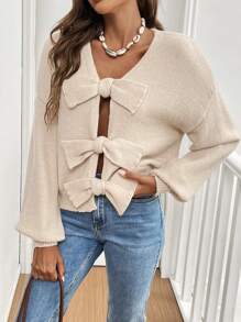 SHEIN Frenchy Suéter de mujer con cuello en V de unicolor, decoración de lazo, hombro caído, manga larga, cálido y cepillado, para uso casual, de oficina, minimalista, "old money", sencillo. Puede usarse sobre una camiseta. Cárdigan lindo, muy cálido y suave, ropa de invierno, parte superior de suéter de mujer, atuendos de otoño para mujer, suéteres de mujer - Albaricoque - Ver 1