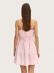 Nöista Robe de lin à fente rose avec nœud papillon, coutures froncées et fermeture à glissière invisible sur le côté. Parfaite pour le printemps, l'été ou les occasions de Pâques. Couleur rose pastel.