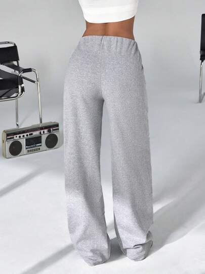 CasuGlow Paneled Jogger Sweatpants, Elastic Ankle Cuffs, High-Waist Design, Side Pockets, Relaxed Fit Athleisure Collection, Knee Panel Detail, Comfort-Stretch Waistband,