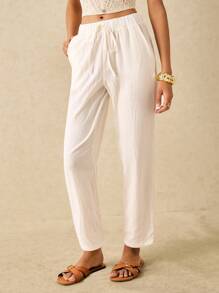 Poéselle Pantalones largos sencillos y básicos para mujer con bordado de patrón de ojo, pantalones blancos de verano, pantalones tipo zanahoria, un esencial chic sin esfuerzo