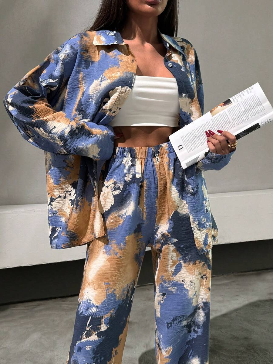 SHEIN Conjunto de 2 piezas con camisa de manga larga y pantalones con estampado floral y botón con piedra para damas
