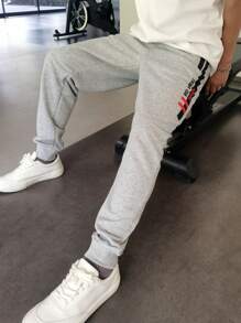 Manfinity Homme Men's Grey Casual Long Sweatpants With Zippered Pocket And Side Stripe Detail - Grey - View 1