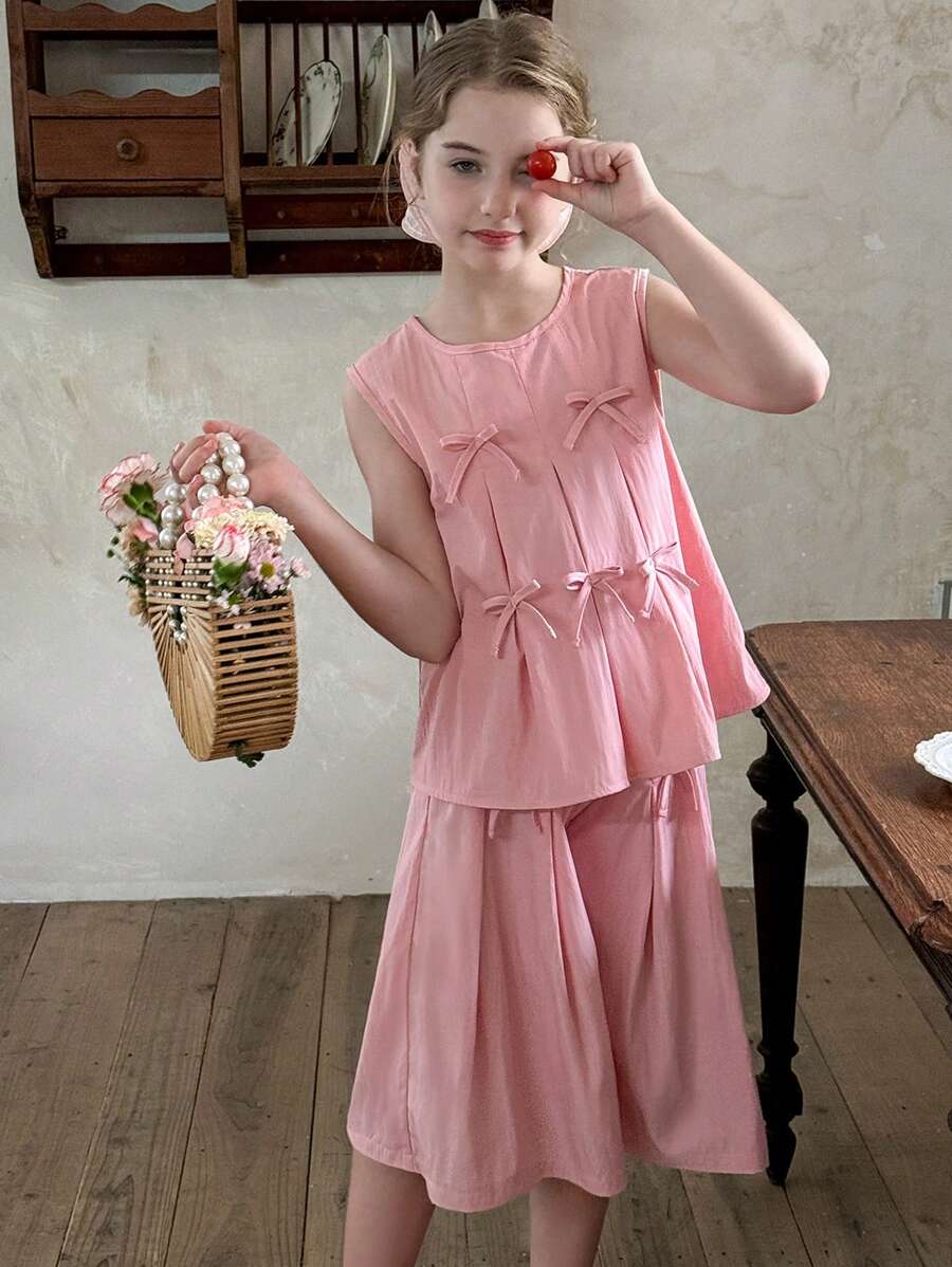 Tween Girls Spring/Summer Casual Vacation Sleeveless Latch Button Bowknot Blouse And Solid Color Wide Leg Bermuda Shorts 2 Pieces Suit, Office/School - Pink - View 1