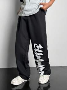SHEIN 1 Piece Tween Boy Casual Sports College Straight Black Trousers With Ribbon Graffiti Letters Suitable For Back To School Suitable For Birthday Parties, Evening Parties, Performances, Weddings, Baptisms, Opening Ceremonies Daily Suitable For Daily Use Suitable For School Suitable For Travel Suitable For Sports Suitable For Spring And Summer Seasons - Black - View 6
