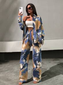 SHEIN Conjunto de 2 piezas con camisa de manga larga y pantalones con estampado floral y botón con piedra para damas