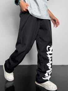 SHEIN 1 Piece Tween Boy Casual Sports College Straight Black Trousers With Ribbon Graffiti Letters Suitable For Back To School Suitable For Birthday Parties, Evening Parties, Performances, Weddings, Baptisms, Opening Ceremonies Daily Suitable For Daily Use Suitable For School Suitable For Travel Suitable For Sports Suitable For Spring And Summer Seasons - Black - View 1