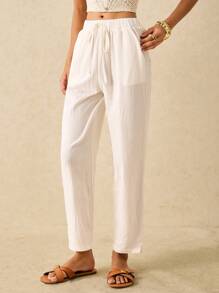 Poéselle Pantalones largos sencillos y básicos para mujer con bordado de patrón de ojo, pantalones blancos de verano, pantalones tipo zanahoria, un esencial chic sin esfuerzo