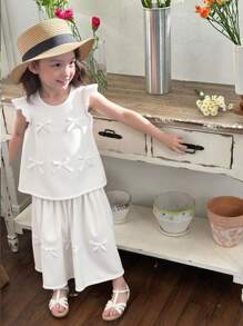 SHEIN 2pcs/Set Young Girl Fashion Cute 3D Bow Decor Round Neck Cap Sleeve Top And A-Line Skirt Suit, Versatile Daily Outfit Suitable For Spring/Summer, Vacation   Holiday  Travel  Summer  Relax