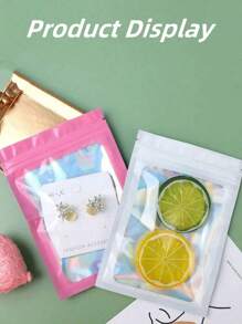 SHEIN 100 piezas Bolsas resellables holográficas iridiscentes, bolsas de embalaje autosellantes con lámina arcoíris, bolsas de plástico coloridas para joyería, regalos, accesorios, cepillos de maquillaje y empaque de regalos