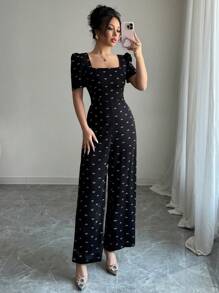 Modelyn Damen Schleifendruck rückenfrei V-Ausschnitt kurze Ballonärmel eleganter Jumpsuit