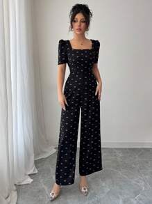 Modelyn Damen Schleifendruck rückenfrei V-Ausschnitt kurze Ballonärmel eleganter Jumpsuit