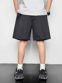 SHEIN Tween Boy Casual Solid Color Decorative Pocket Elastic Waist Shorts, Suitable For Autumn, Spring, Summer, Suitable For Outdoor Play, School, Street Style, Party And Home Leisure