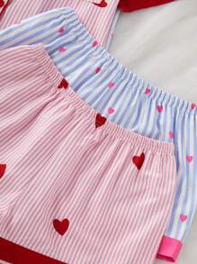 SHEIN Set de 2 piezas con parte superior de polo de manga corta de apertura frontal y pantalones cortos de bloqueo de color con estampado de burbujas y patrón de corazón