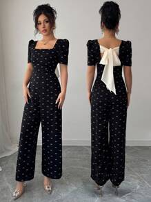 Modelyn Damen Schleifendruck rückenfrei V-Ausschnitt kurze Ballonärmel eleganter Jumpsuit