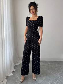 Modelyn Damen Schleifendruck rückenfrei V-Ausschnitt kurze Ballonärmel eleganter Jumpsuit