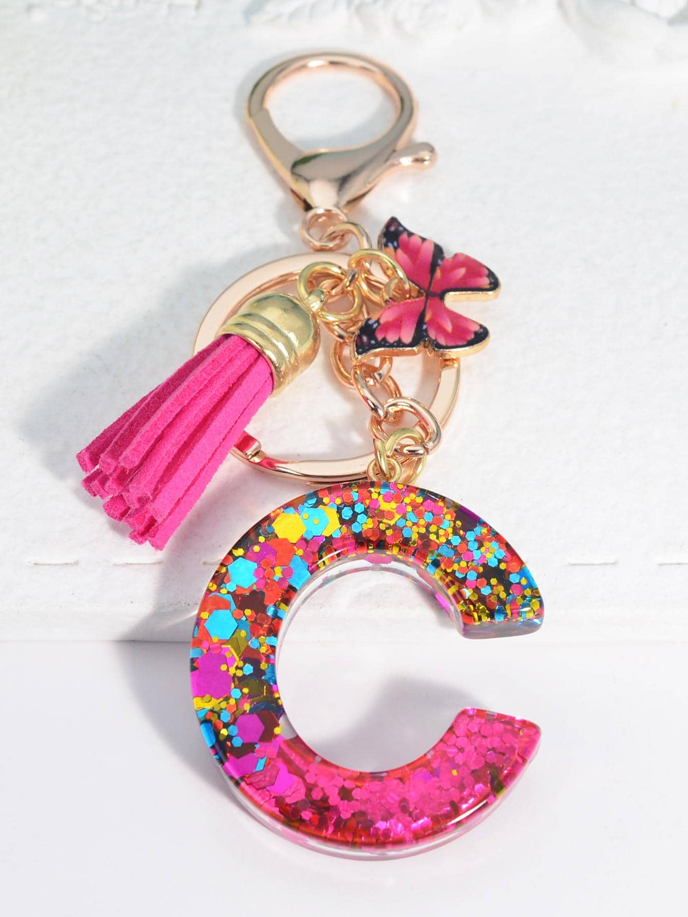 Móc khóa tua rua & chữ cái - Nhiều màu - Xem 1