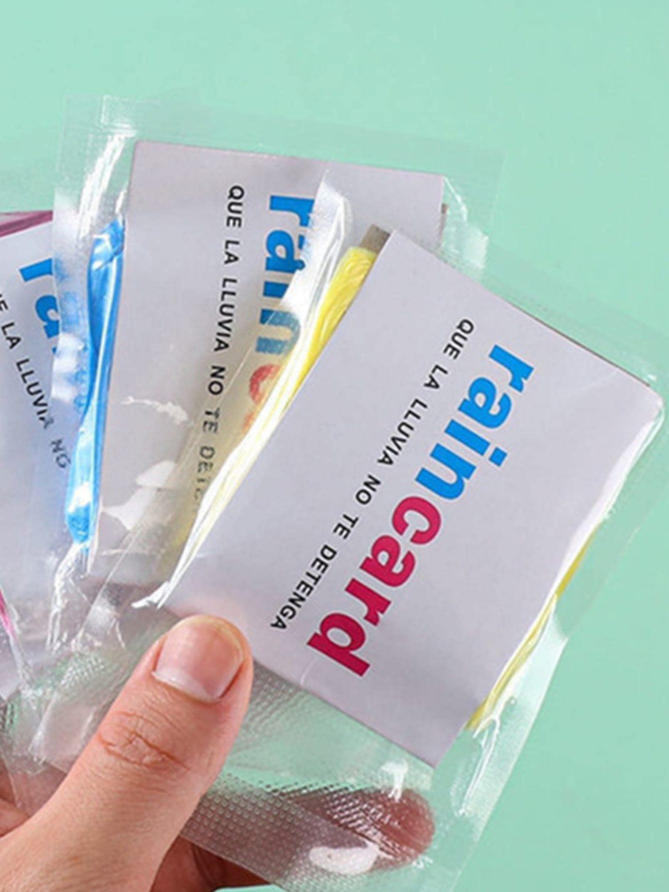 1 pieza Ropa de lluvia liso minimalista de color al azar portátil desechable con capucha para exterior - Multicolor - Añade 3