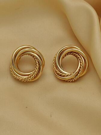 Pendientes de tachuela con diseño girante