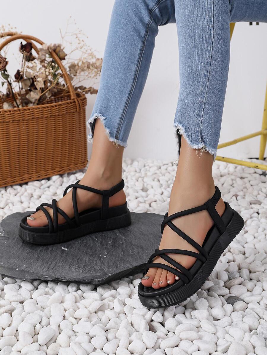 Xăng đan màu đen dành cho nữ đi nghỉ, Xăng đan quai ngang đế bằng Criss Cross - màu đen - Xem 1