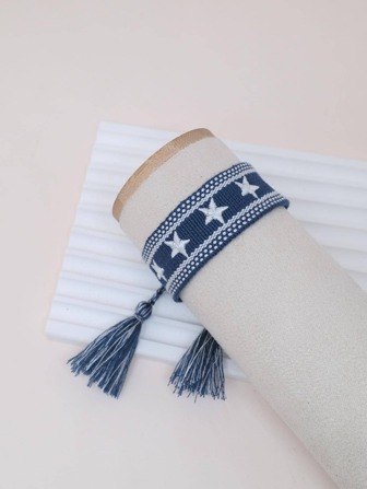 Stjärnbroderad tofsdekorarmband