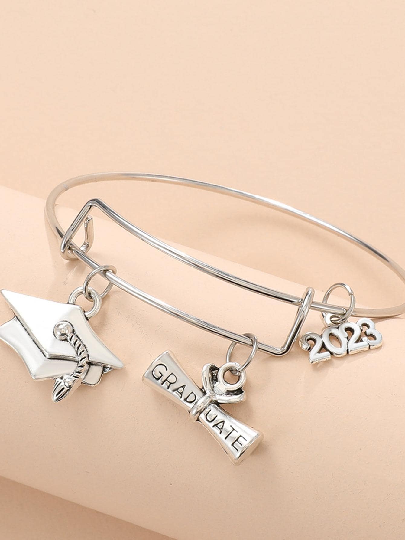 Details more than 84 graduation charm bracelet latest ceg.edu.vn