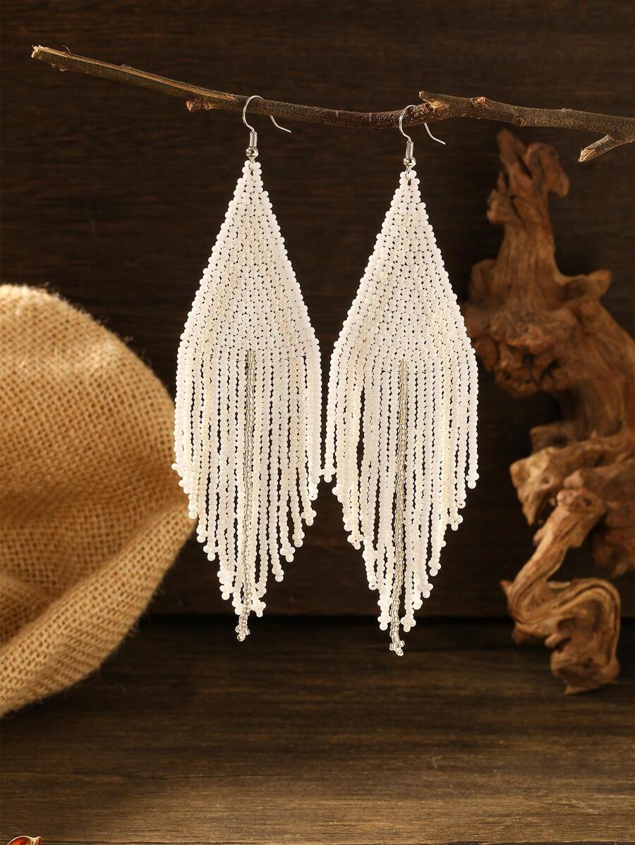 Pendientes largos cuenta con fleco
