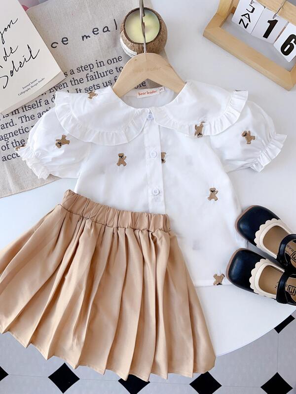 Conjunto de blusa de manga curta com estampa de urso fofo para meninas + saia plissada, roupa de verão para volta às aulas
