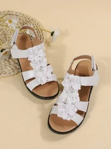 Nuovi sandali per donna 2025 estate stile europeo e americano, con tacco a zeppa traforato, punta aperta, design floreale, chiusura a strappo, sandali bianchi stile romano