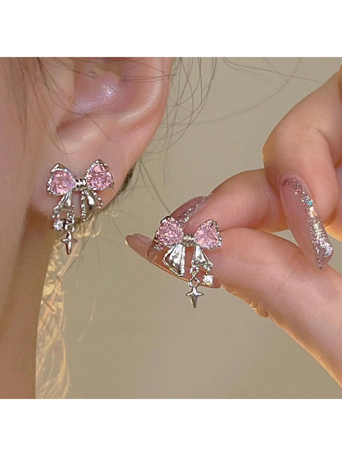 Rhinestone bow stud earrings