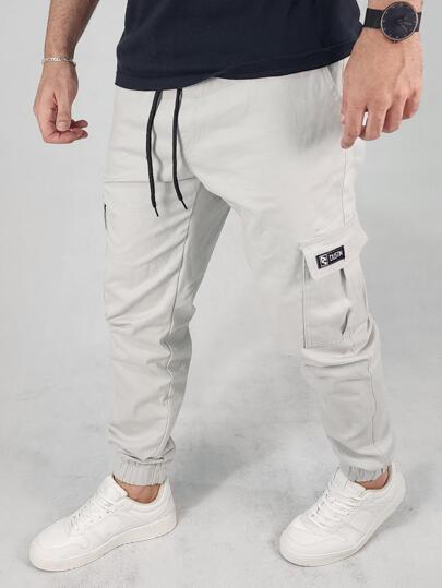 Calça Cargo Jogger Masculina Sarja Elastano com Cordão e Bolsos Festas Final de Ano
